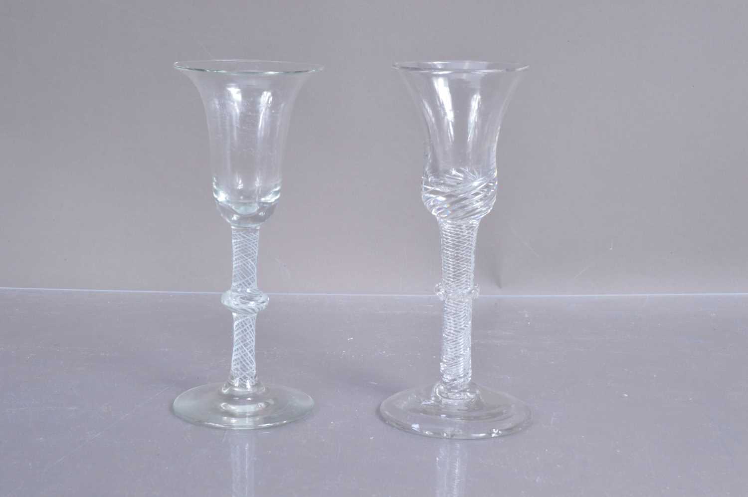 Two Georgian glass wine drinking glasses,