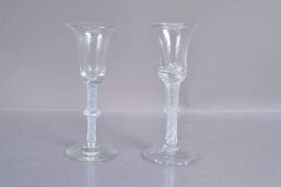 Two Georgian glass wine drinking glasses,