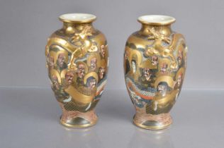 A pair of Japanese Meiji period Satsuma earthenware vases,