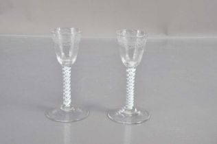 A pair of Georgian glass drinking glasses,