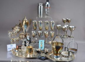 A quantity of silver plated and metal barware and serveware,