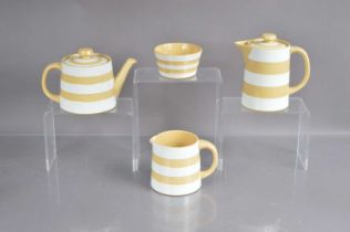 A set of four Cornishware items in cream and white colourway,