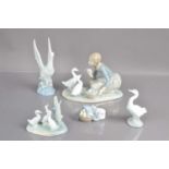 A good group of five Lladro and Nao duck, goose and geese figurines,