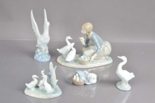 A good group of five Lladro and Nao duck, goose and geese figurines,