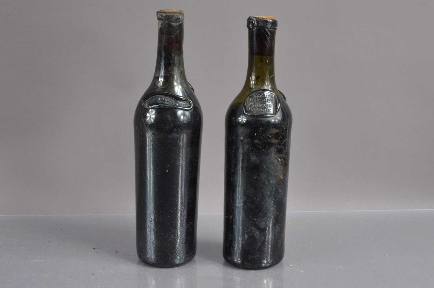 Two extremely rare hand-blown double-sealed French 'cylinder' wine bottles corked with contents c.18