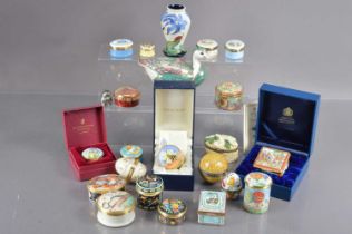 A modern miniature Moorcroft vase together with a collection of numerous enamel boxes,