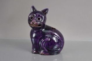 A very unusual 19th Century art pottery model of a cat (possibly the Cheshire Cat from Alice in Wond