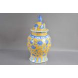 A large and decorative Chinese lidded vase,
