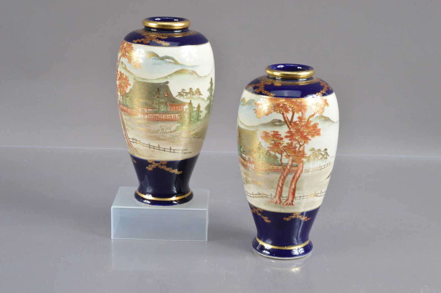 A pair of Japanese Meiji period Satsuma earthenware vases,