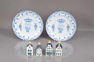 A decorative pair of reproduction Chinese export porcelain 'Portuguese Market' style plates,