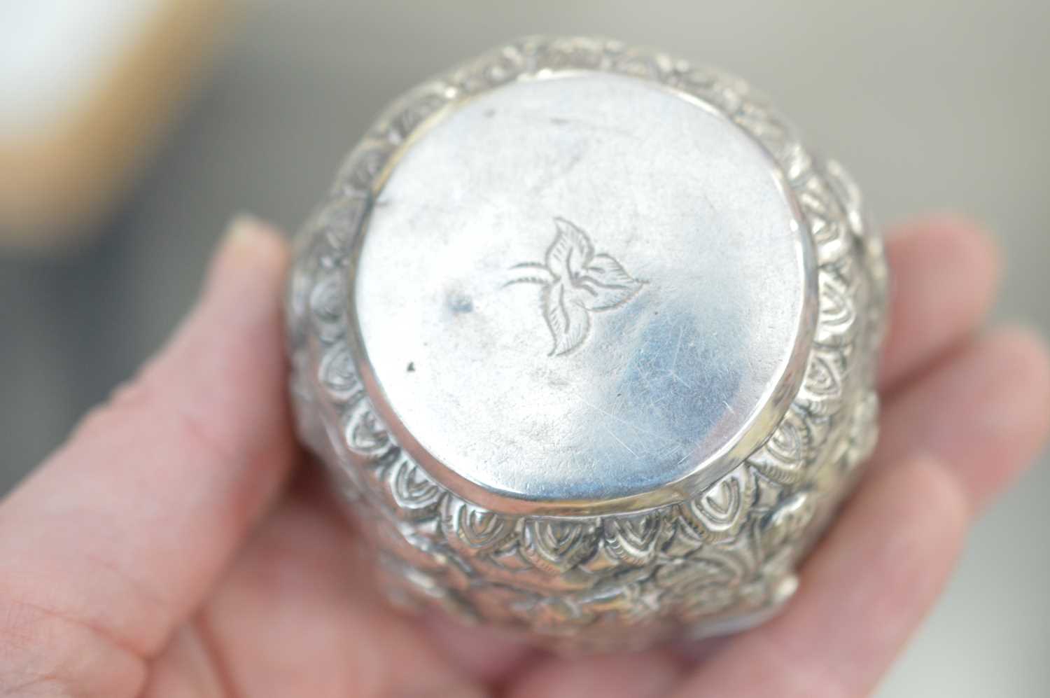 A small Burmese repoussé metalwork 'thabeik' bowl, - Image 3 of 3