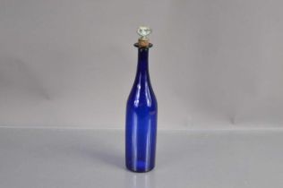 A 'Bristol Blue' glass bottle-shape decanter with silver plated 'Brandy' label stopper,