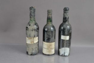 Three bottles of various Ports,