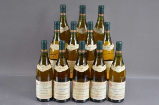 Twelve bottles of Meursault Genevrieres 1er Cru 1986,