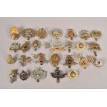 A collection of British Cap badges,