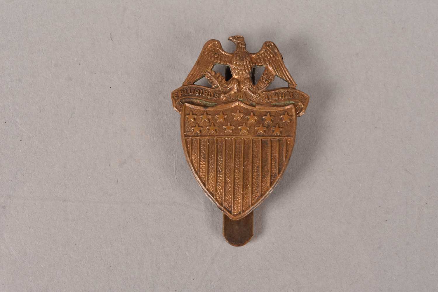 A WWI US Army Field Cap badge,