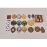 A collection of Shooting Medallions,