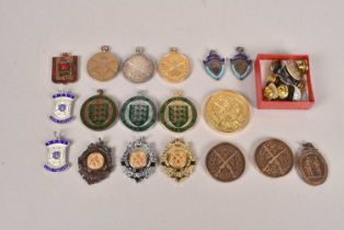 A collection of Shooting Medallions,