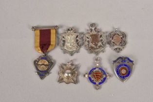 A collection of silver hallmarked cycling medals,