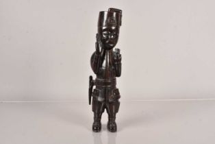 An African carved wooden Authority Figure,