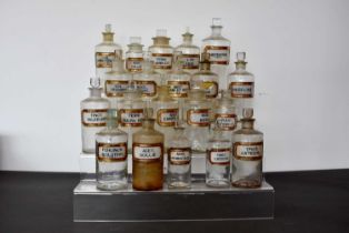 A group of twenty Pharmaceutical glass bottles with stoppers,