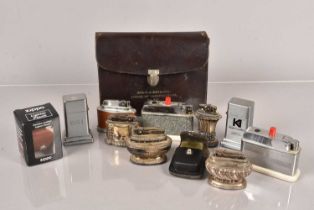 A small collection of table lighters,