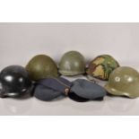 A collection of World Helmets and Caps,