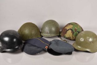 A collection of World Helmets and Caps,