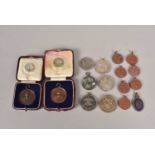 An assortment of military related medallions,