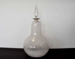 A large glass bottle and stopper,
