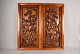 A pair of Oriental Hardwook panels,