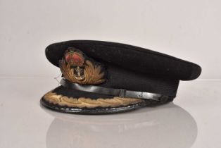 A Naval Captain's Peak Cap by Moss Bros,