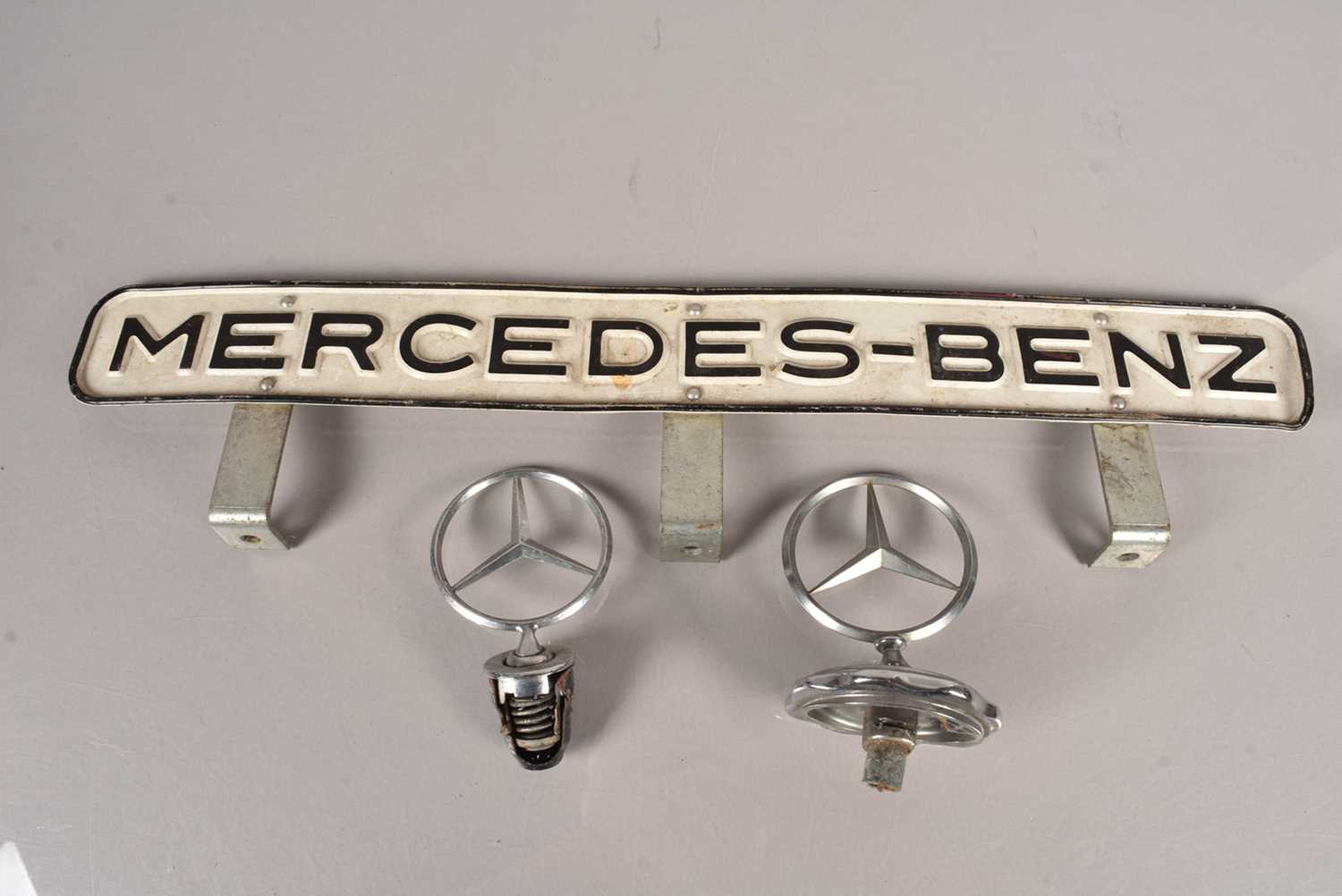 Two Mecedes-Benz Bonnet Badges,