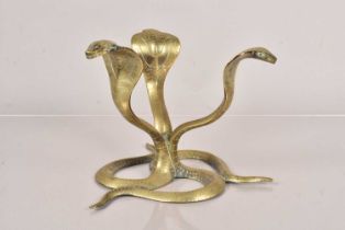 A Benares brass figure of three cobras,