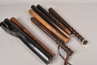 Four Wooden Police Truncheons,