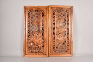 Two Oriental hardwood panels,