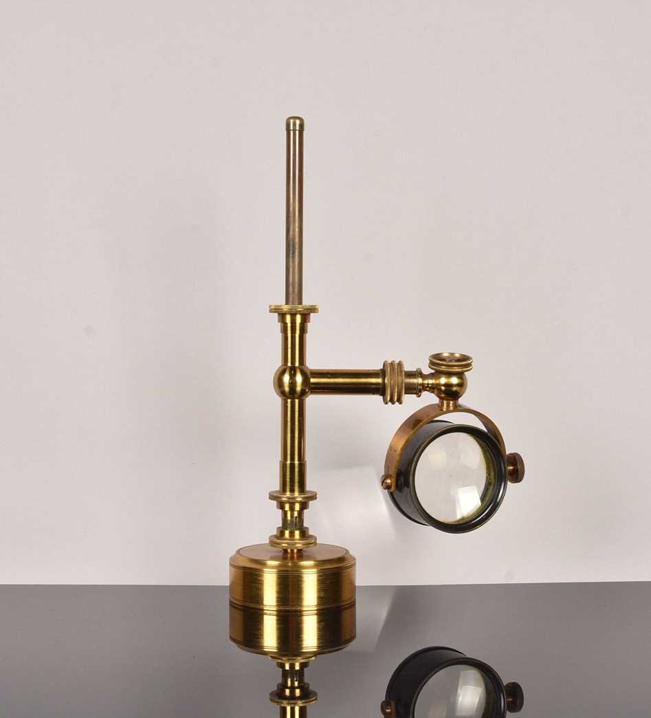 An unusual 19th Century lacquered brass bulls-eye condenser,