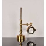 An unusual 19th Century lacquered brass bulls-eye condenser,