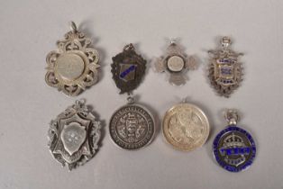 An assortment of late 19th Century silver hallmarked Cycling medals,