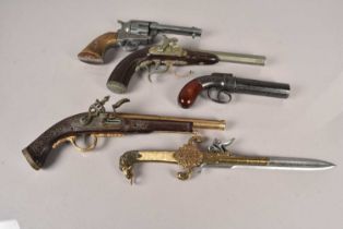 A group of five decorative wall mount pistols,