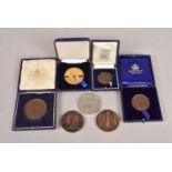 A collection of National Rifle Association medallions,