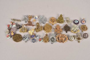 An assortment of Military badges,