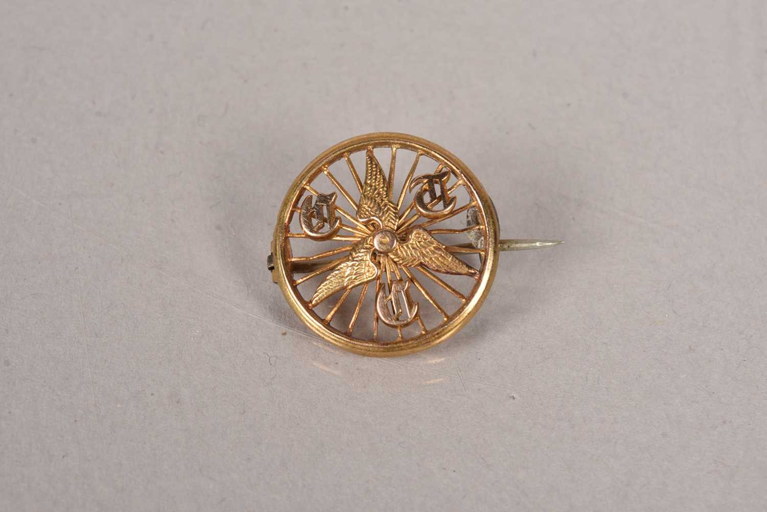 A 15ct gold Cyclist Touring Club pin badge,