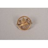 A 15ct gold Cyclist Touring Club pin badge,