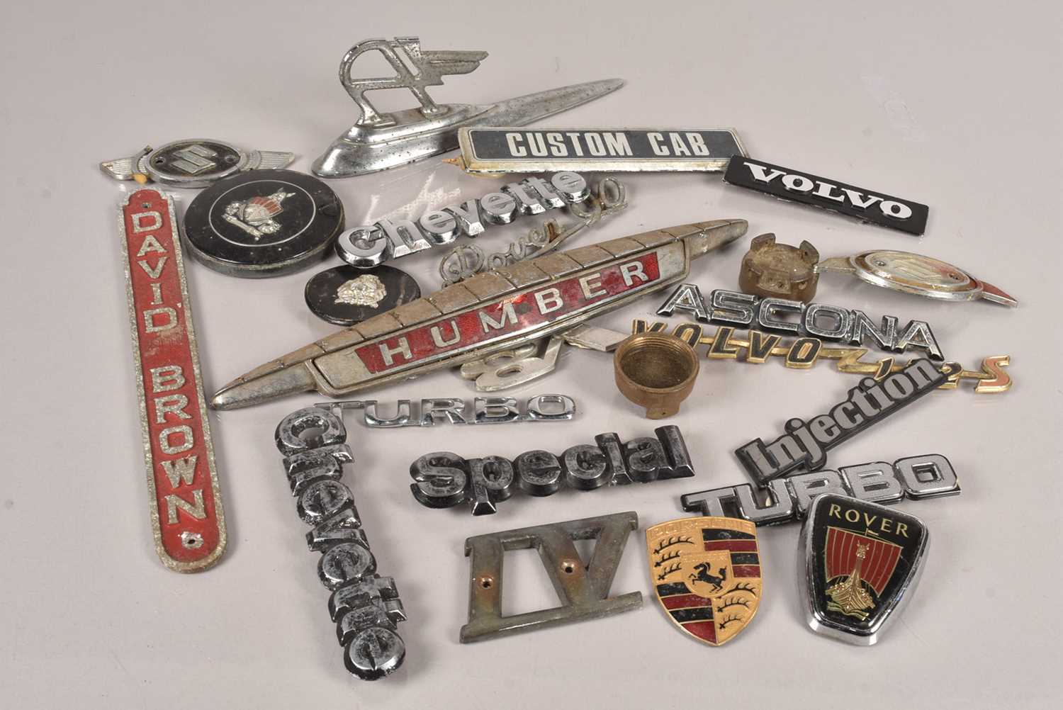 A collection of Motoring badges,
