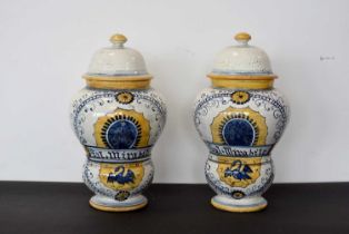 A pair of 20th Century Pharmacy lidded jars,
