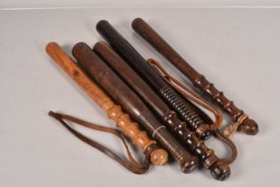 Five wooden Police Truncheons,