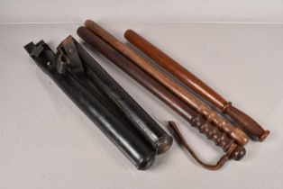 Three long Wooden Police Truncheons,
