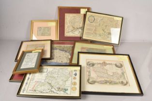 An assortment of various etched maps,