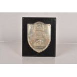 A 1937 mounted silver HMV Plaque,